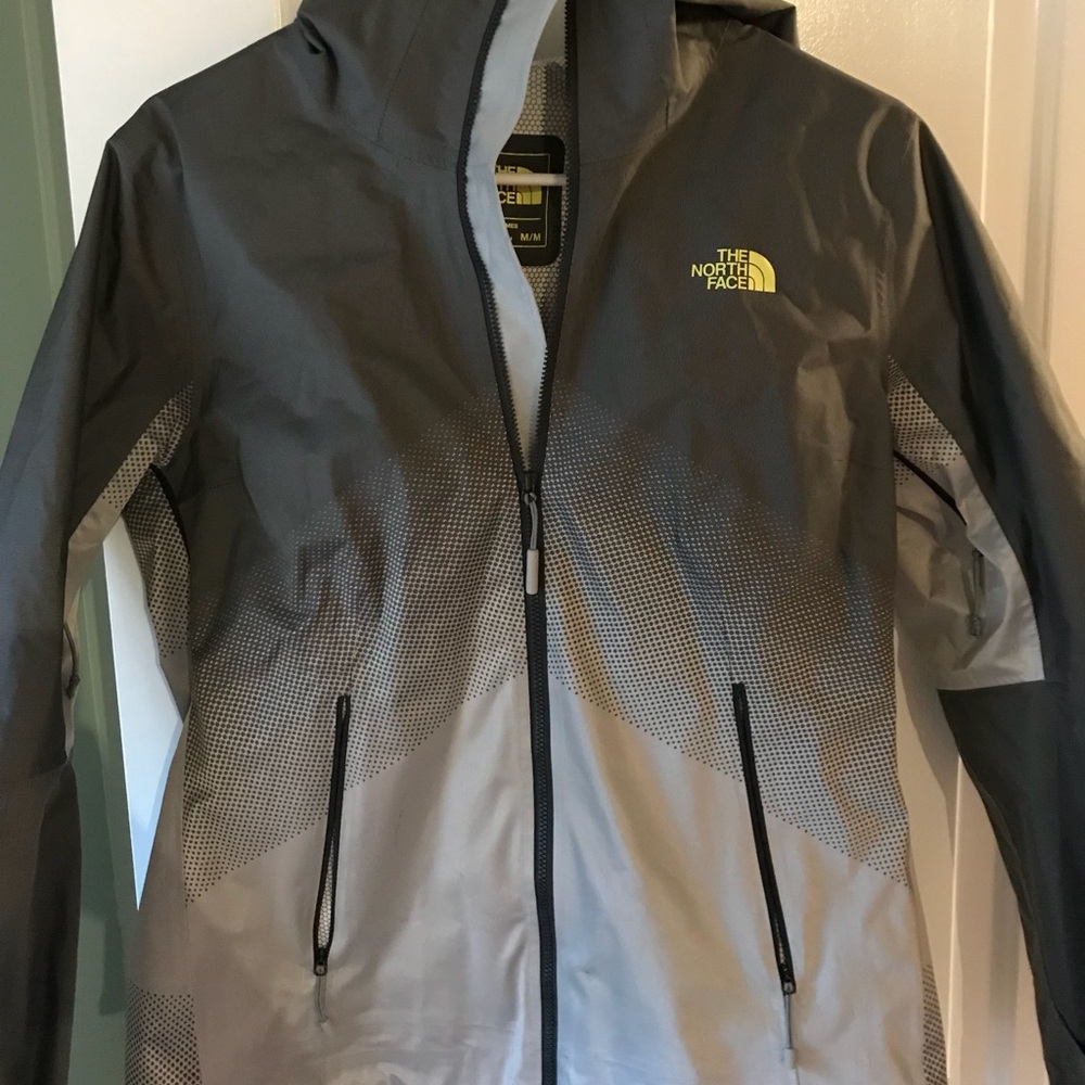 Women’s North face rain jacket. Never worn.